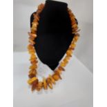 Individually strung/knotted graduated amber necklace