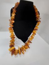 Individually strung/knotted graduated amber necklace