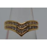 18ct yellow gold double row of diamonds (26 graduating stones) in a wishbone design ring, stamped