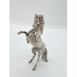 A silver Arabian Stallion in a rearing stance, approx weight 105g