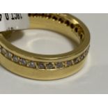 18ct yellow gold ring with 0.45ct diamonds set into the whole of the band. Approx size J. hallmarked