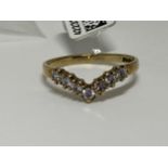 9ct Yellow gold seven stone diamond wishbone ring, approx size m, approx 0.21ct, hallmarked 375.