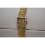 Vintage 18ct yellow gold and diamond Omega ladies watch, working at time of cataloguing. Approx 0.