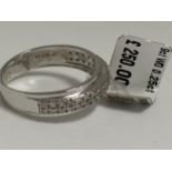 9ct white gold ring featuring 0.25ct twin row of diamonds. Approx size l, stamped 375, This item has