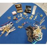 A large quantity of costume jewellery including jewellery boxes, rings, watches necklaces,