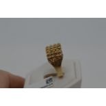 9ct yellow gold four row Gate keeper ring, approx size T/U. marked 375, approx gross weight 3.7g.