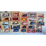 A collection of 95 Lledo Promotional, Commemorative and Souvenir vans, most with boxes, some with