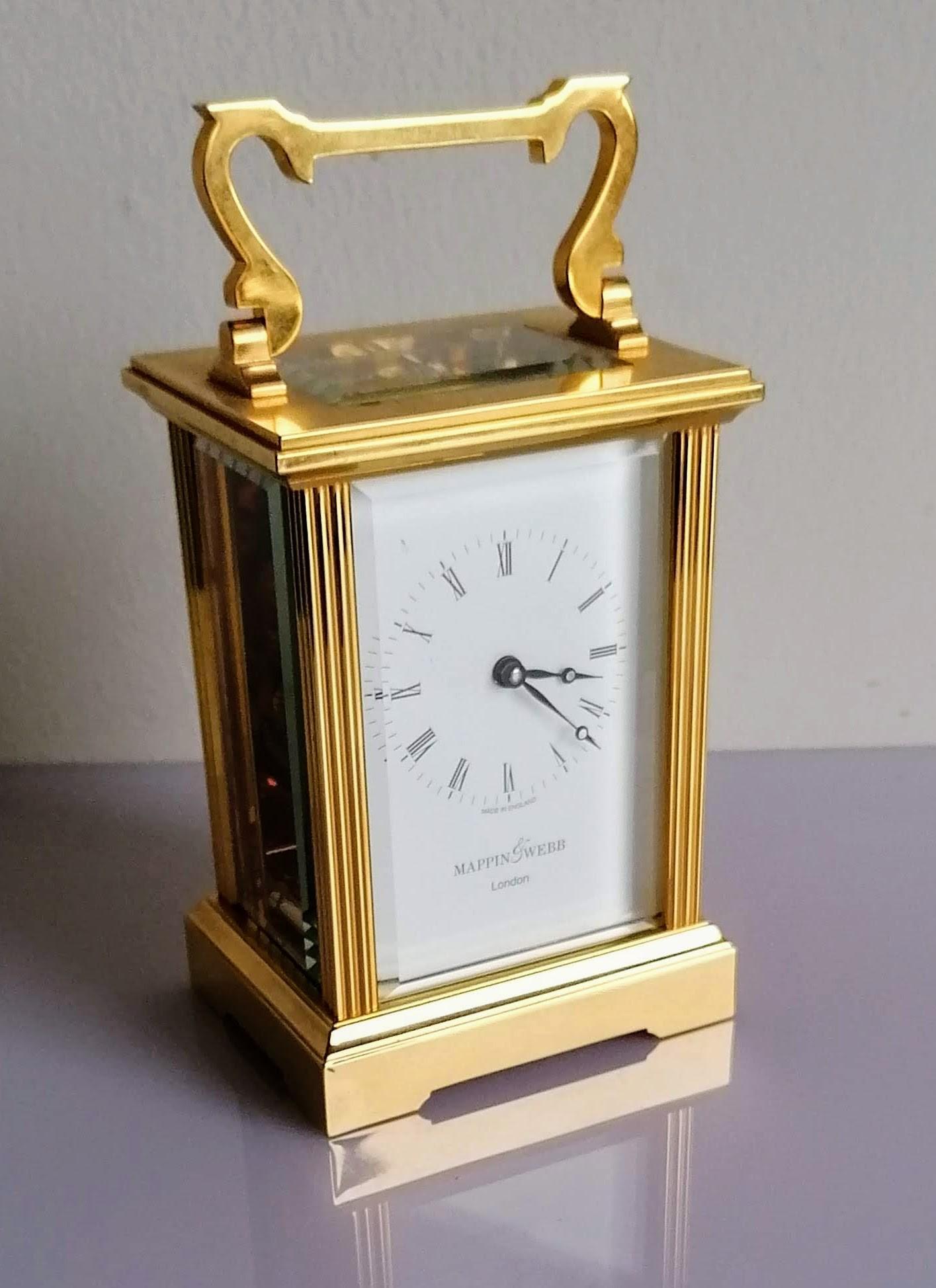 A Mappin & Webb brass carriage clock, in working order, 15 cm H, including handle