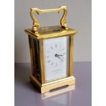 A Mappin & Webb brass carriage clock, in working order, 15 cm H, including handle