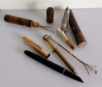 A rolled gold Parker 51 fountain pen; two treen needle cases; silver cheroot holder, swizzle stick