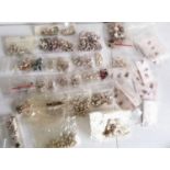 A large quantity of white metal London souvenir charms, some marked 'SILVER'.