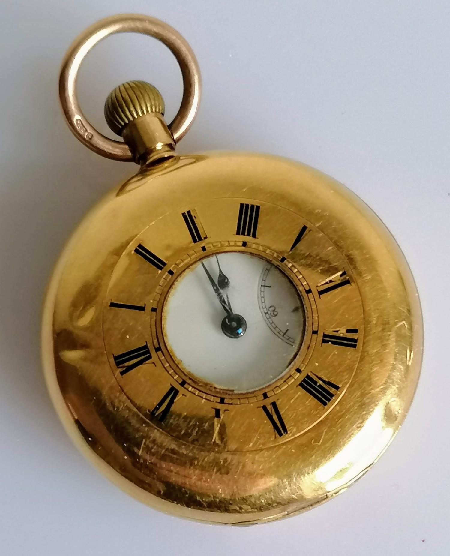 An 18ct gold cased half hunter pocket watch, stem wind, outer and inner Roman numerals, subsidiary