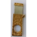**ADDENDUM ** A mid-20th century 9ct yellow gold-cased cigar cutter with bark effect texture, 55mm