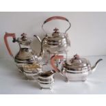 An Art Deco silver plated five piece tea/coffee service including a tea kettle by Roberts & Belk,