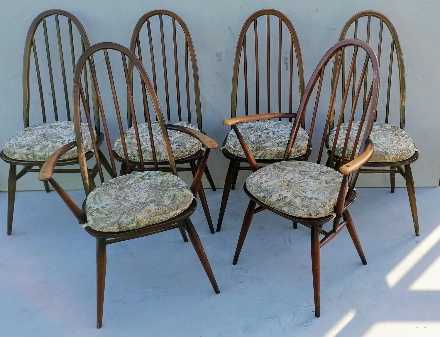 A set of six (4+2) Ercol blue label elm and beech spindle-back Quaker Windsor dining chairs,