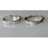 A white gold eternity ring, size P, hallmarked 750, 2.95g and another, size Q, hallmarked 585, 2.5g,