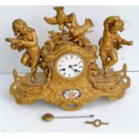 A 19th century French porcelain and ormolu mantel clock, the striking movement by Japy stamped