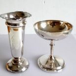A George V silver vase with wavy rim on a weighted base by Synyer & Beddoes, Birmingham, 1915 and
