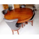 A Henredon for Ralph Lauren Polo oval extending dining table, plain frieze, one extra leaf on a