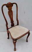 A period Queen Anne walnut chair with shaped and painted splat and legs, 102 cm H