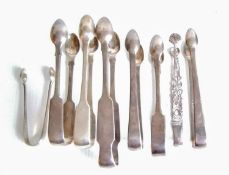 An assortment of eight late Georgian and early Victorian sugar tongs by various makers to include: