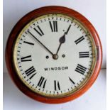 A Victorian mahogany circular wall clock with white dial, 30 cm, Roman numerals, fusee mechanism,