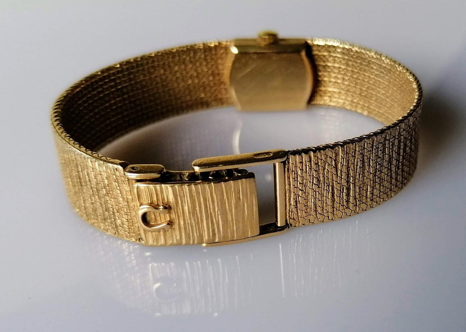 A mid-century Omega ladies dress watch with a gold case and bark-effect bracelet strap, in working - Image 3 of 3