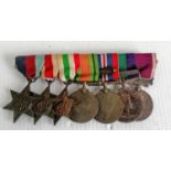 A group of seven medals awarded to No. 7587625 W. O. CL. 1 E. FORDRED. R. A. O. C.:- 1939/45 star,