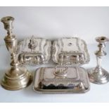 A pair of Victorian silver plated entree dishes with rococo decoration, (both with twist on