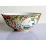 A Chinese famille rose medallion bowl with inverted rim and an iron-red six-character Qianlong