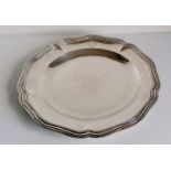 A late 19th century French circular silver platter with reeded border, hallmarked for Eugene