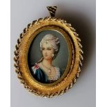 An Italian 18ct yellow gold-framed oval miniature portrait of a lady, indistinctly signed, stamped