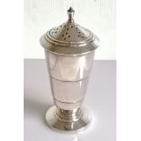 An Art Deco silver sugar caster with a conical top, stepped body, lined interior, on a splayed
