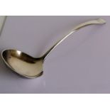 An Art Deco silver ladle by Elkington & Co., Birmingham, 1936, initialled, 26cm, 166g