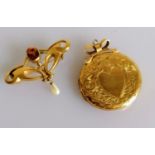An Art Nouveau citrine and pearl brooch with an etched pendant locket, both on 9ct yellow gold and