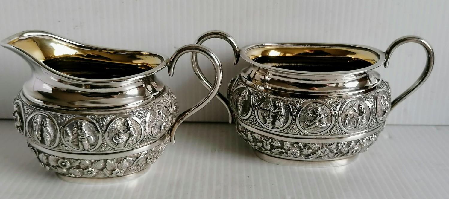 A colonial Indian silver two-handled sugar bowl, matching cream jug and tongs stamped silver and a - Image 2 of 6