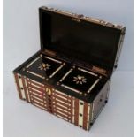 A 19th century ivory bound tea caddy with lidded interior, foil-lined compartments with key, 15 h