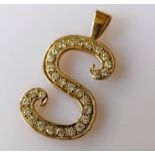 A mid-century yellow gold and pave-set diamond S-shape pendant, approximate total diamond weight 2