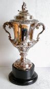 A Victorian two-handled silver trophy cup and cover with profuse rococo decoration by Edward Ker