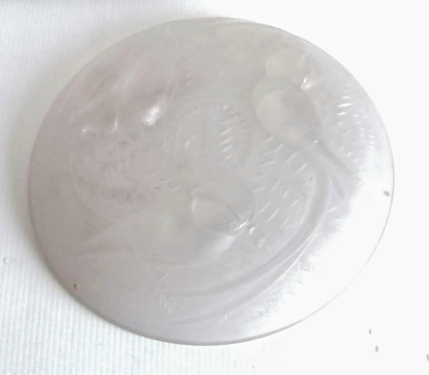 An Art Deco opalescent glass plafonnier depicting birds on a textured surface, stamped for P. d?