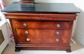 A Ralph Lauren Polo mahogany chest of drawers with black marble top, frieze drawer, ring-turned