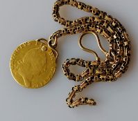 A George III gold sovereign, 1788, 8.6g on a gold chain, tests for gold, 9.65g. (total weight 18.