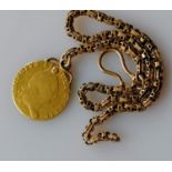 A George III gold sovereign, 1788, 8.6g on a gold chain, tests for gold, 9.65g. (total weight 18.