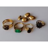 Four gem-set 9ct gold rings, various sizes and a pair of cufflinks with seed pearl decoration (one