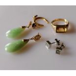 A pair of 18ct white gold earrings, each with four brilliant-cut diamonds; a baguette-cut citrine (
