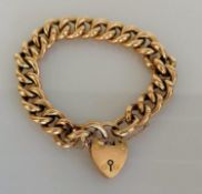 A 9ct rose gold curb-link bracelet with padlock clasp and fixed safety chain, each link stamped,