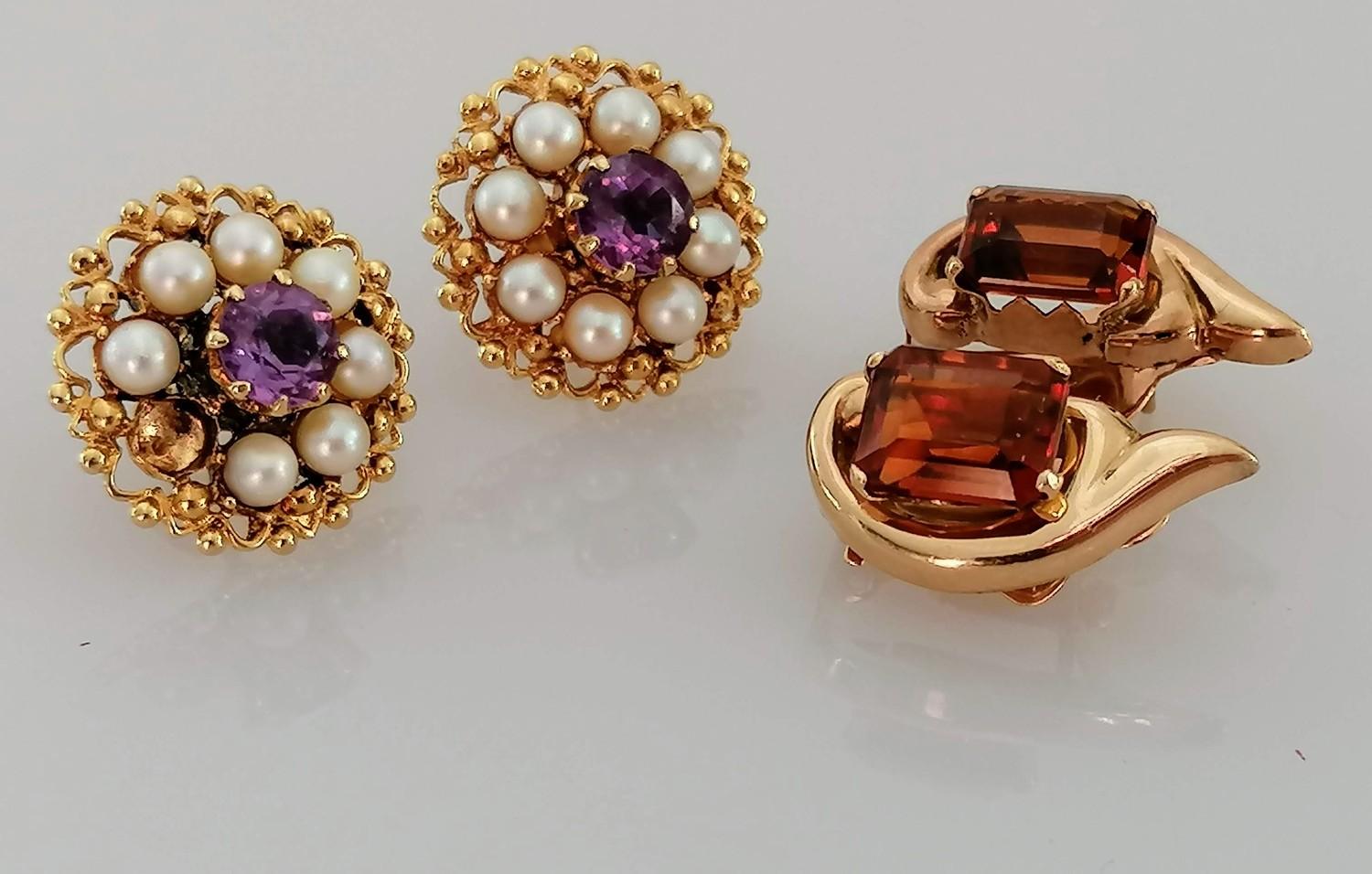 A pair of 9ct gold earrings with amethyst and pearl decoration, hallmarked, 6g, one pearl missing