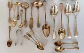 A miscellany of Georgian English silver flatware comprising serving/tablespoons, tea spoons,