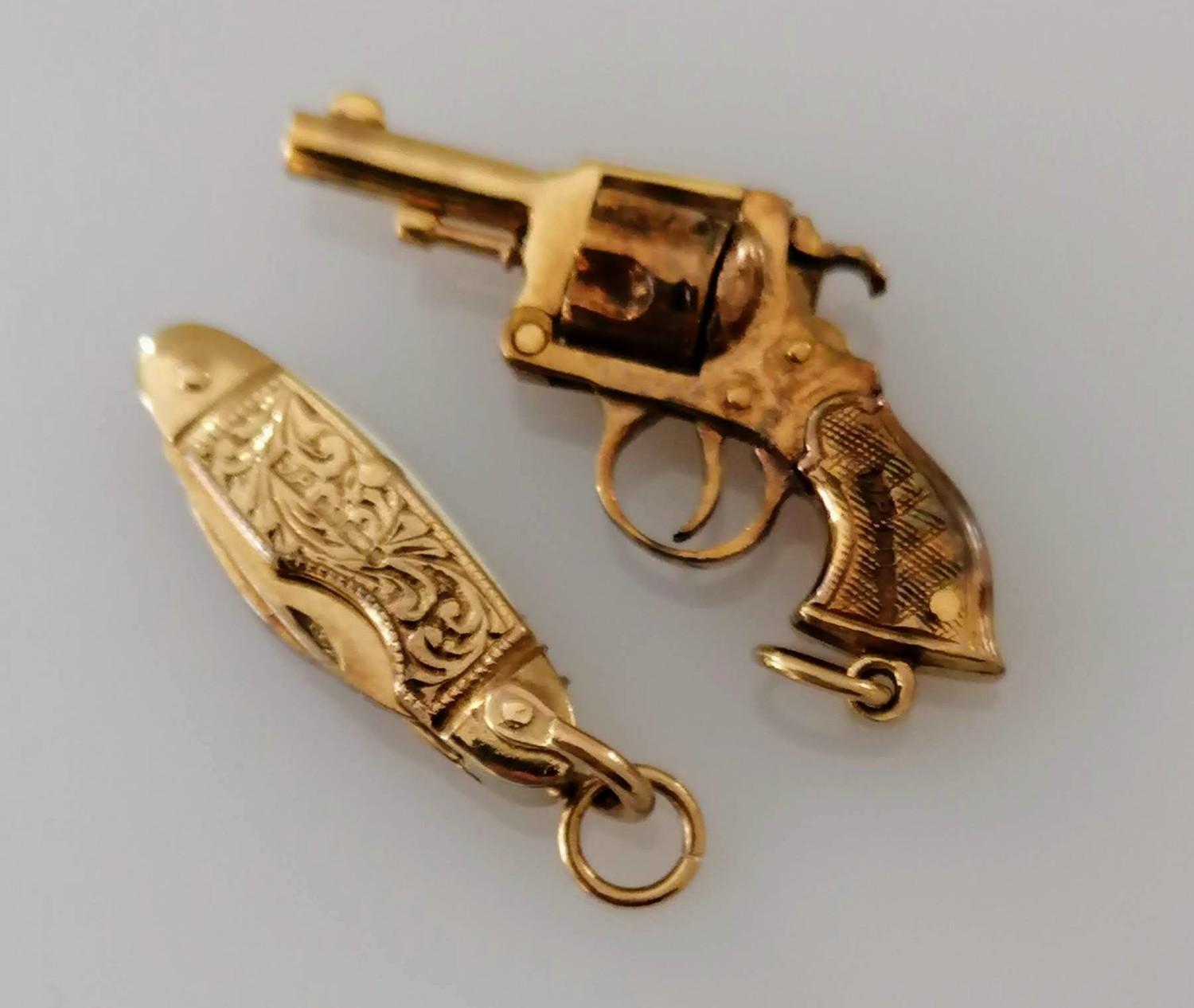 A 9ct gold pistol pendant or charm and penknife, both hallmarked, 38mm, 28mm, 12.6g - Image 2 of 2