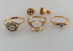 Three gem-set gold rings, sizes M, M, I and a pair of earrings, all hallmarked, 5.94g (4)